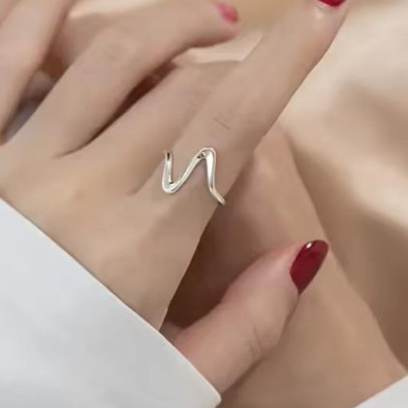 Bague ondulée ONDINA argentée ajustable en acier inoxydable avec zircons – Van Lys